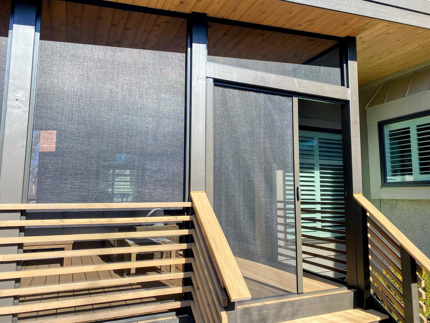 Mirage 3500 large opening retractable screen installed on a modern patio deck